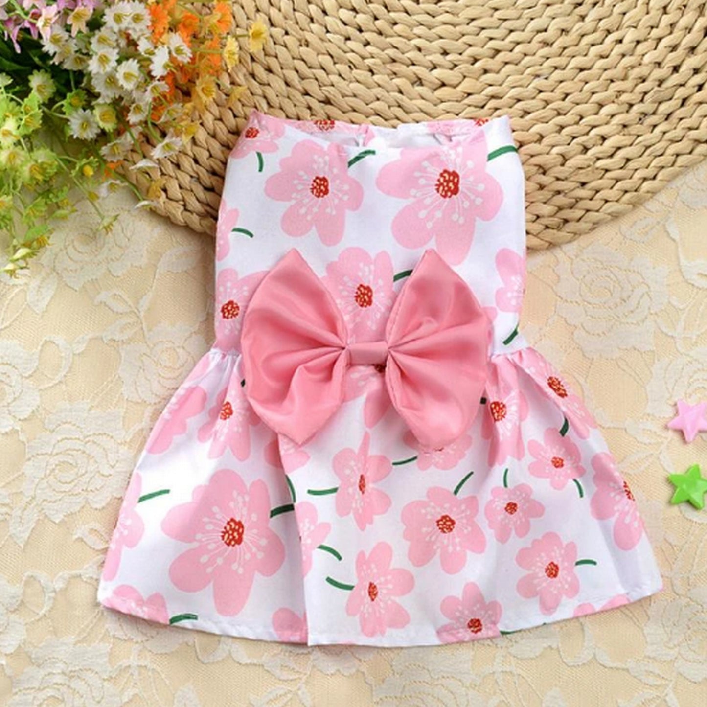Robe avec nœud rose pour chien